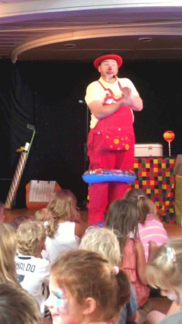 Curley Wurley Clown doing Baby Shark dance on Brittany Ferries stage