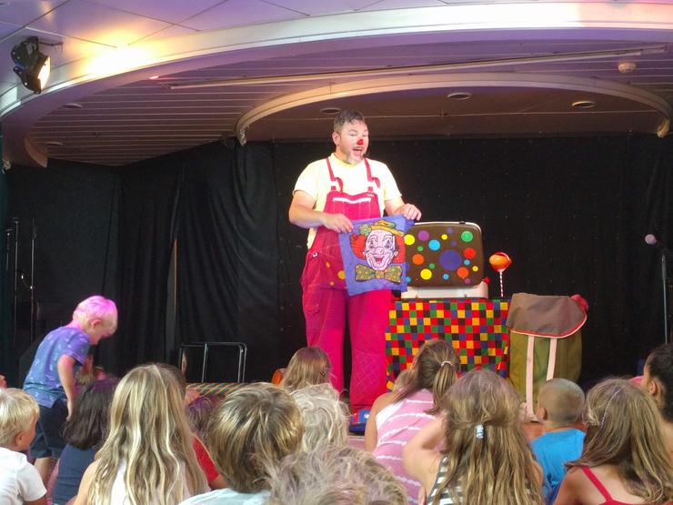 Curley Wurley Clown performing his stage show on a Brittany Ferries stage